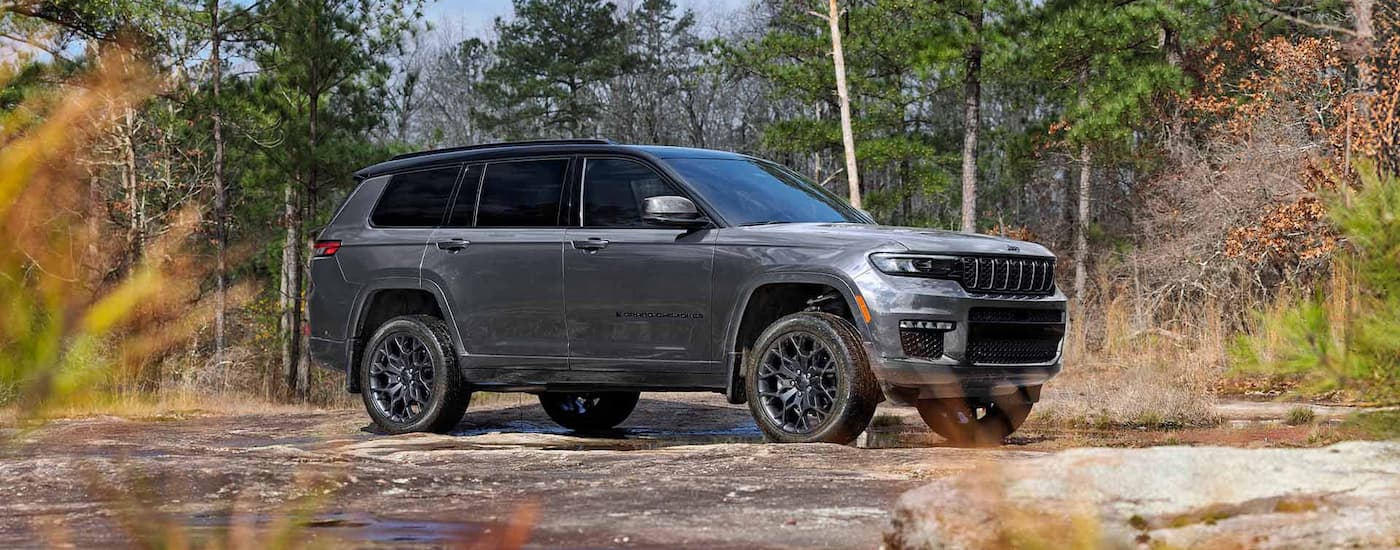 Grey 2026 Jeep Grand Cherokee L parked off-road.