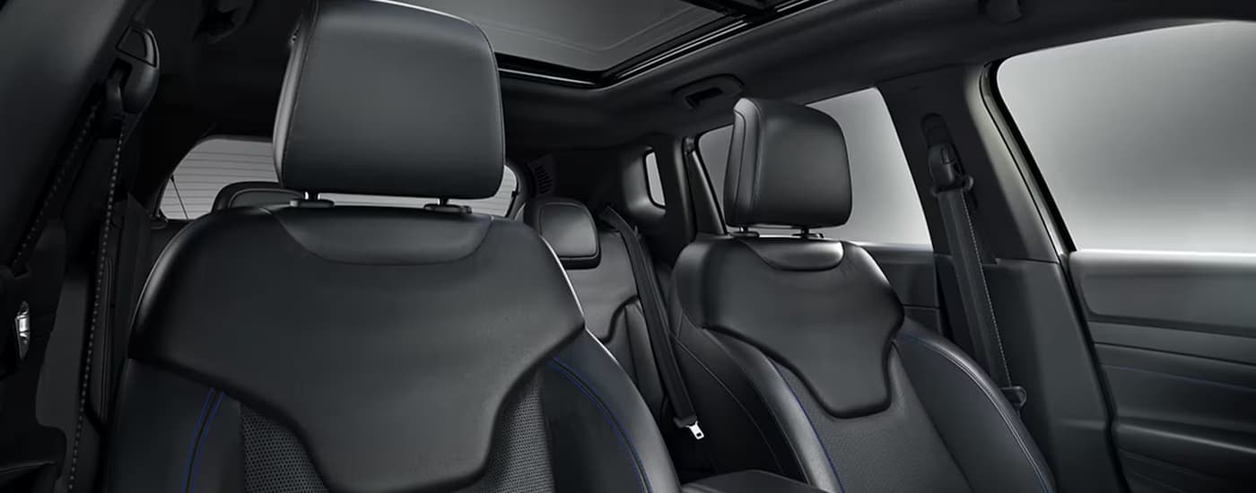 Black leather interior of a 2026 Jeep Compass